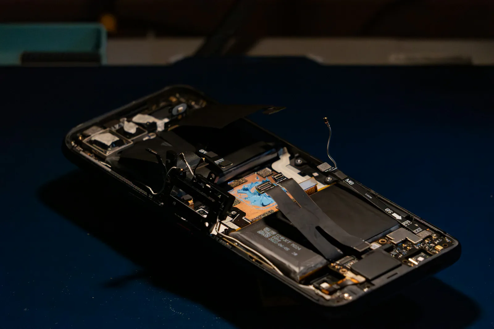 Disassembled smartphone showing its internal components